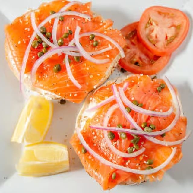 A bagel with sliced Nova & Cream cheese.